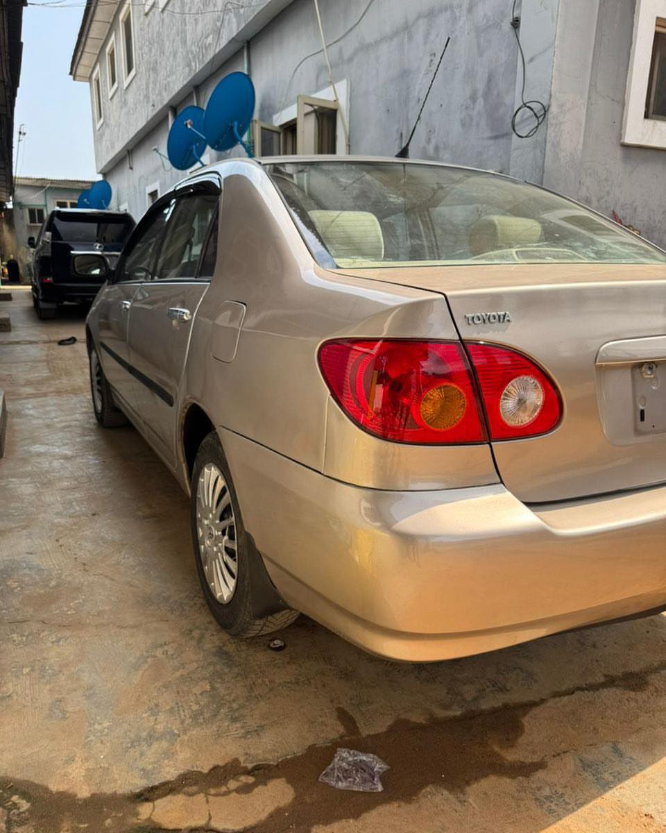 Proven 2003 Corolla: Chilled AC & Ready to Drive