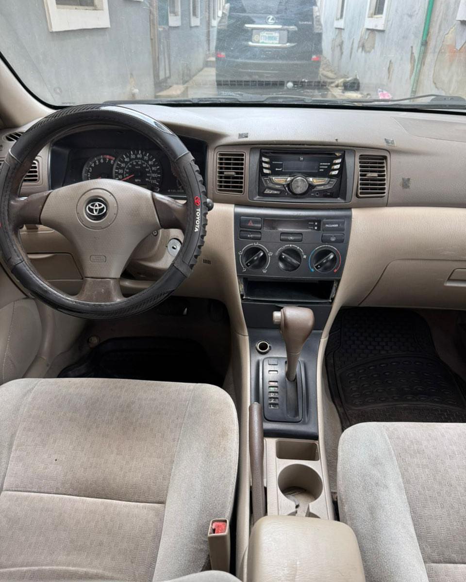 Proven 2003 Corolla: Chilled AC & Ready to Drive