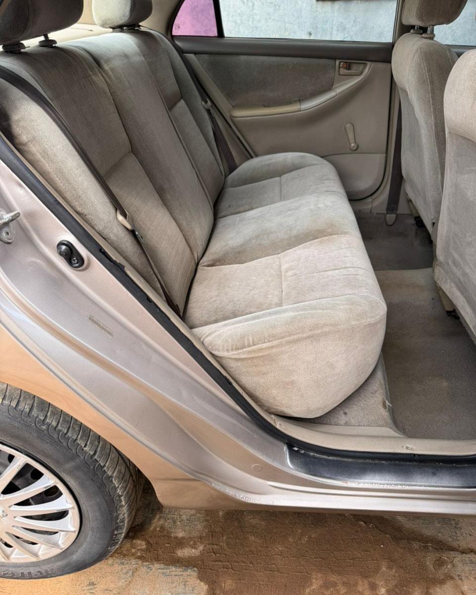 Proven 2003 Corolla: Chilled AC & Ready to Drive