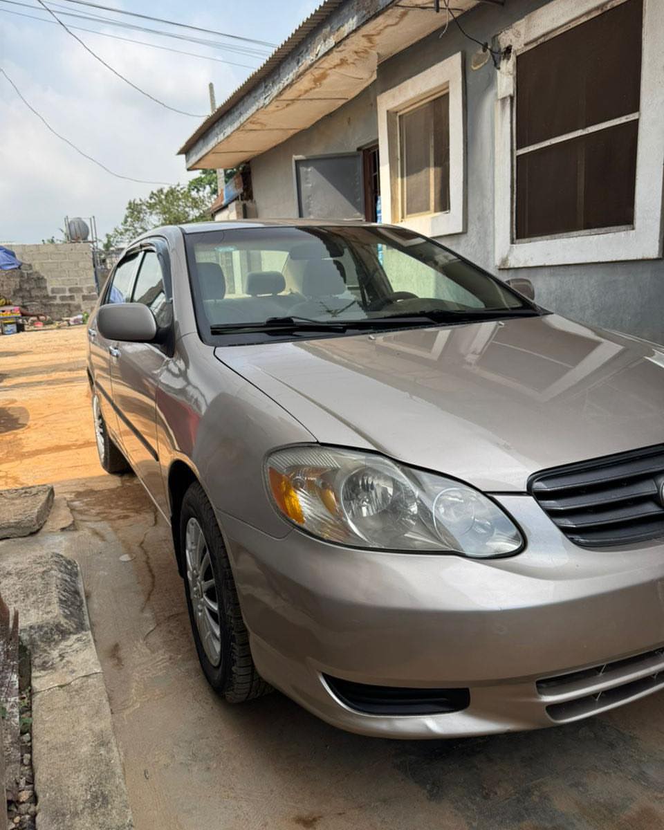 Proven 2003 Corolla: Chilled AC & Ready to Drive