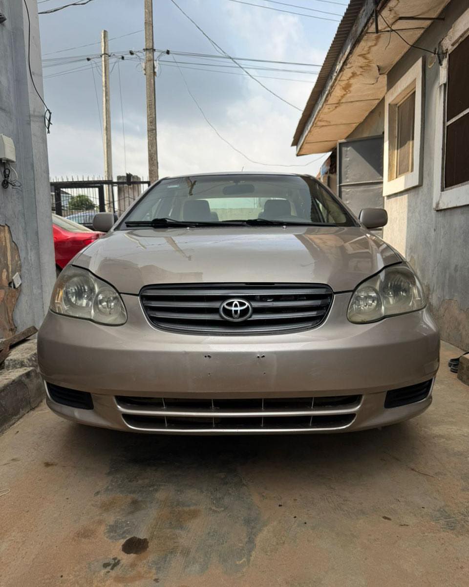 Proven 2003 Corolla: Chilled AC & Ready to Drive