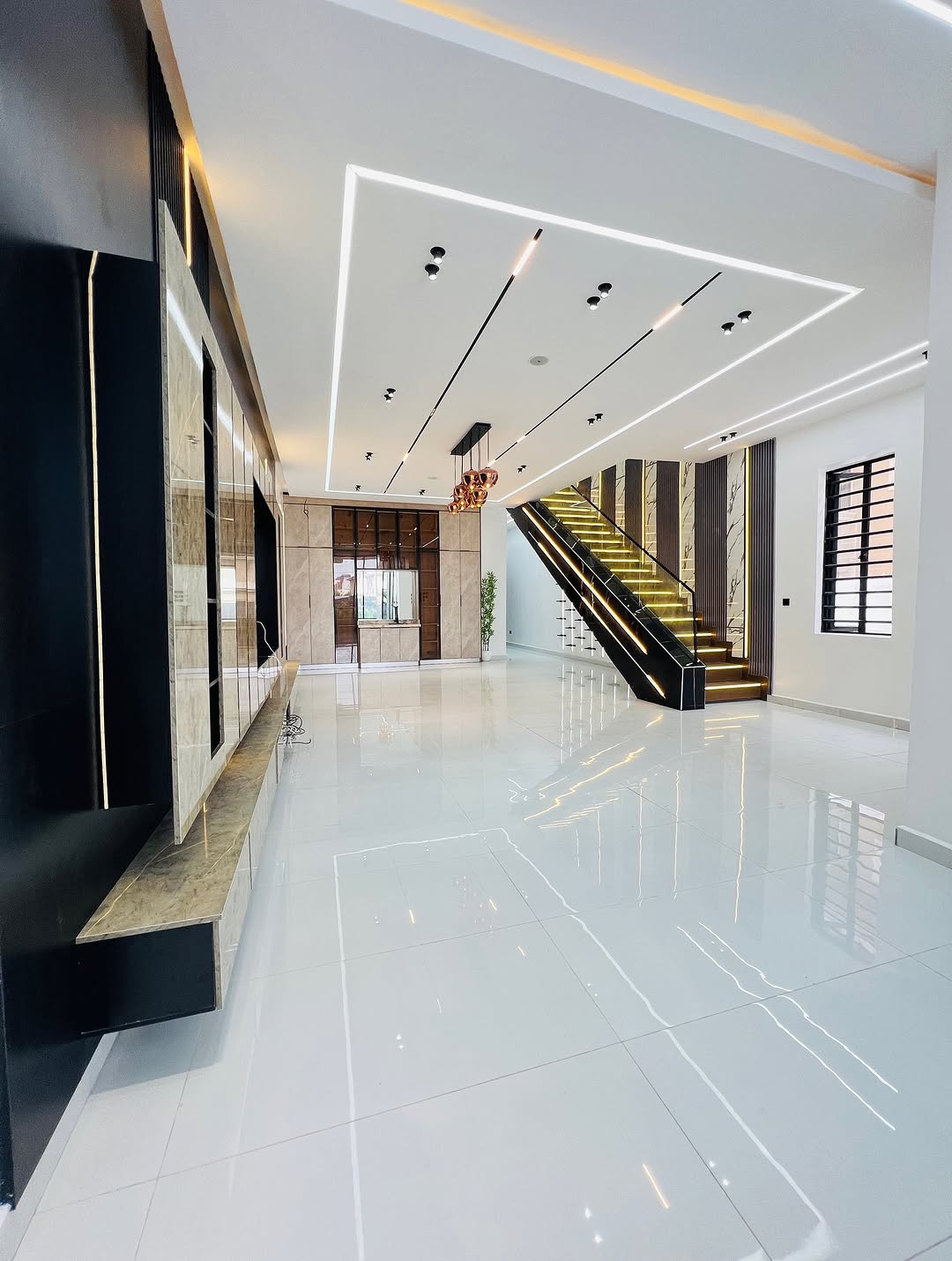 Sleek 5-Bed Duplex with Rooftop Cinema & Pool