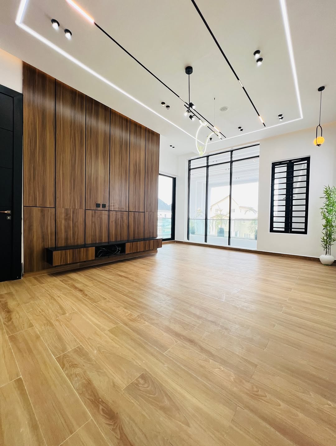 Sleek 5-Bed Duplex with Rooftop Cinema & Pool