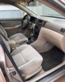 Proven 2003 Corolla: Chilled AC & Ready to Drive