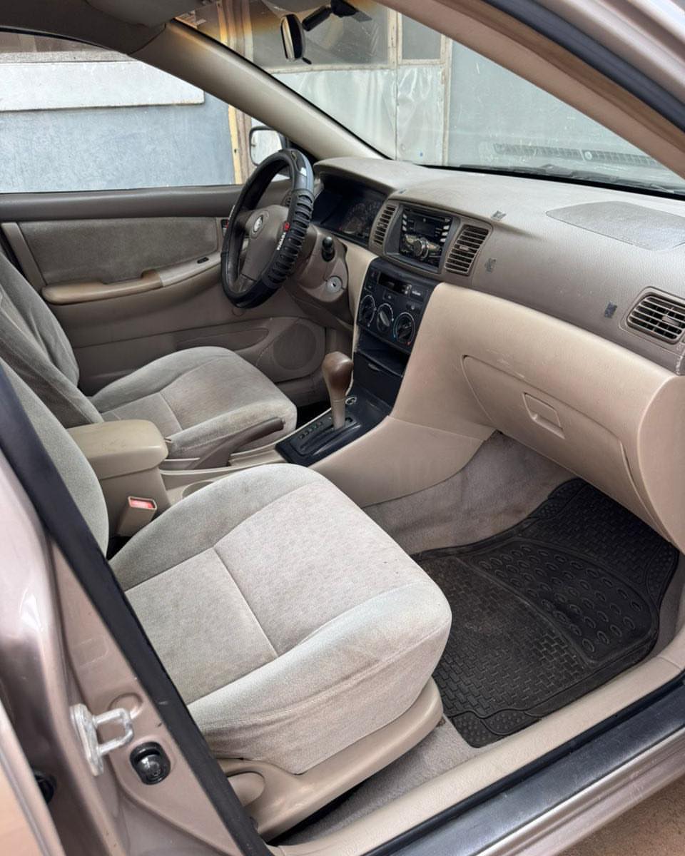 Proven 2003 Corolla: Chilled AC & Ready to Drive