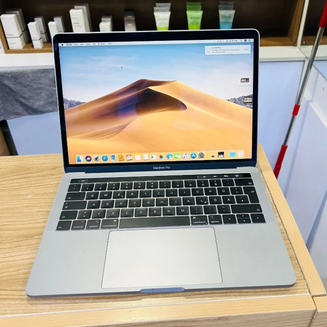Unleash Power: 2018 MacBook Pro i7 with Touch Bar
