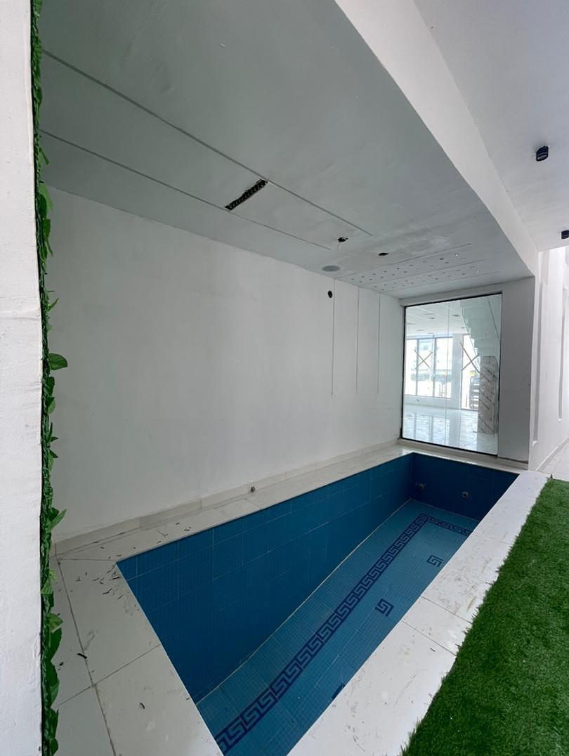 Spacious 5-Bedroom Duplex with Private Gym & Cinema