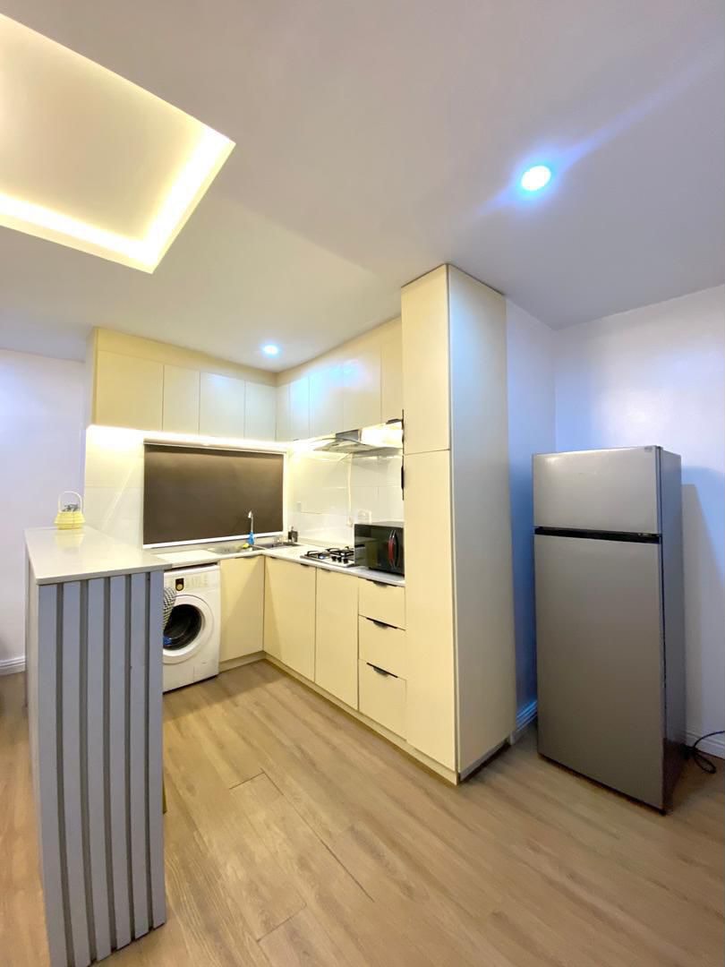 Seaside Luxury: Modern 1-Bedroom with 24/7 Power & WiFi