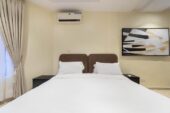 Lekki Phase 1 Oasis: Serene 1BR with 24/7 Power & WiFi