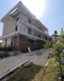 Grand 7-Bed Mansion with 2 Pools & Rooftop Escape in Katampe