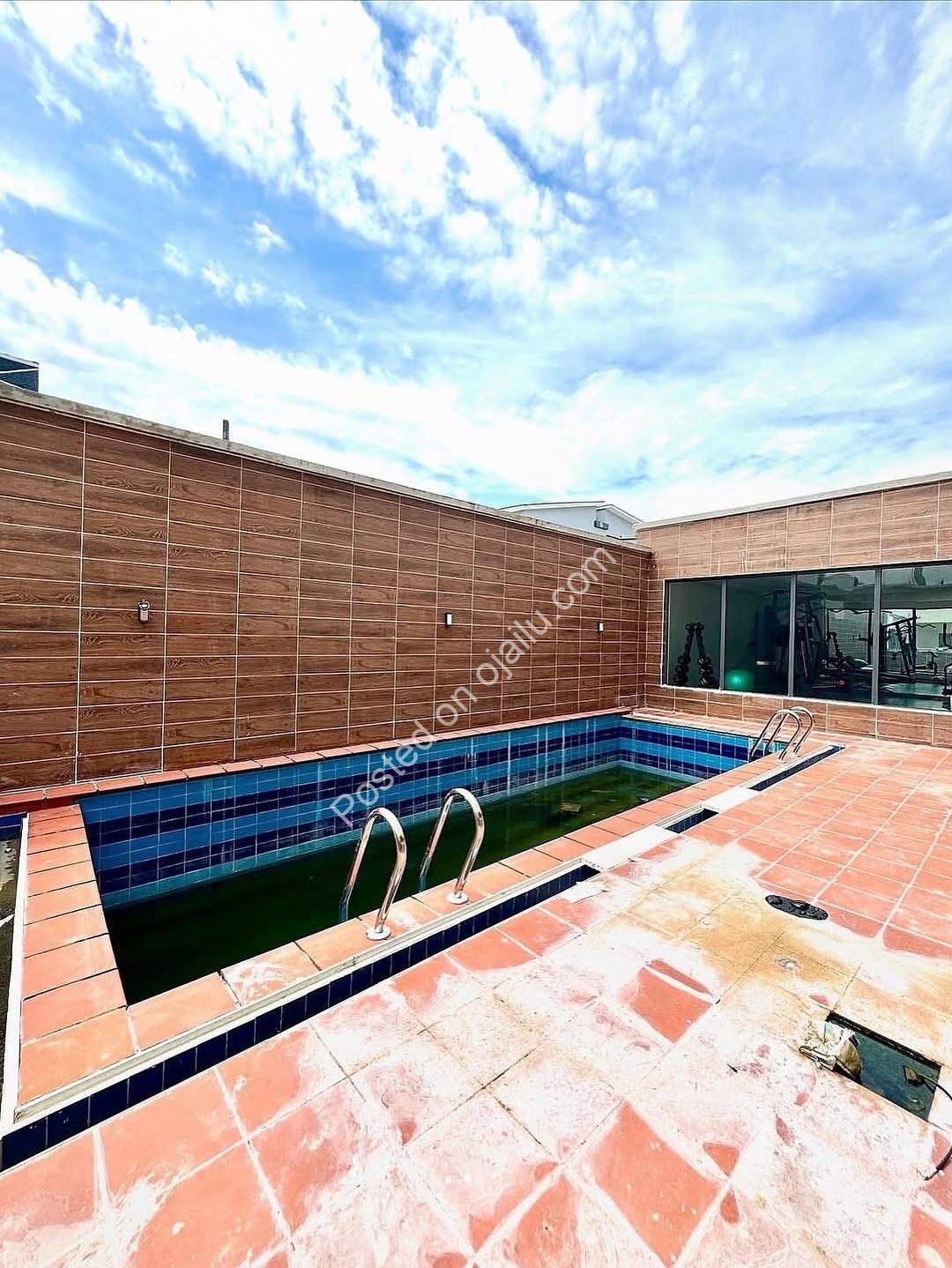 Lekki’s Ologolo Oasis: 2BR with Pool & 24/7 Power