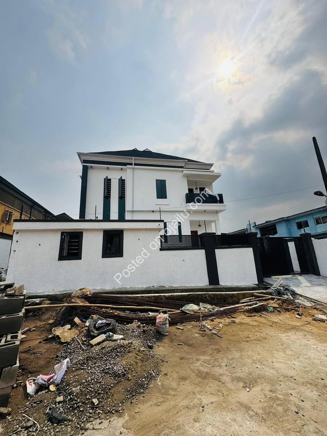 Grand 6-Bedroom Duplex with BQ in Secure Ojodu Estate