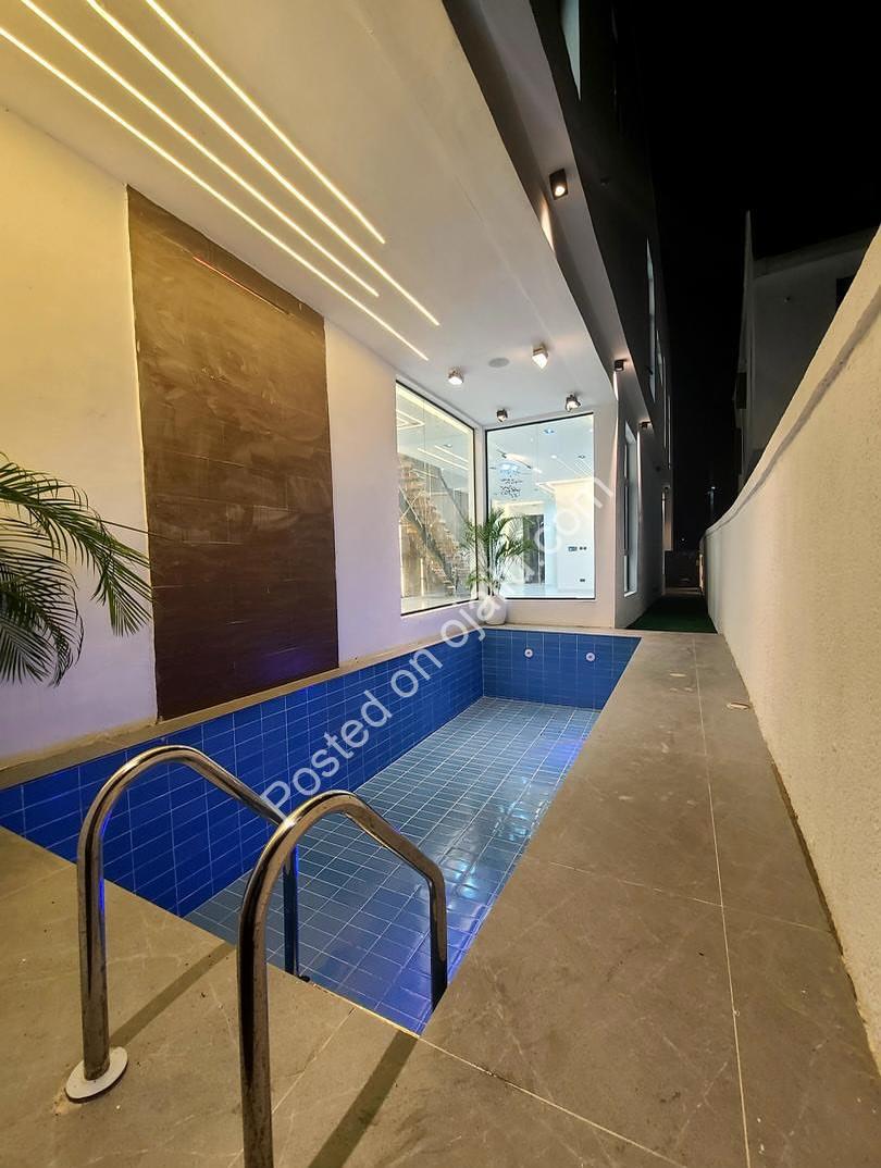 Luxury 5-Bedroom Estate with Private Pool in Ikota GRA