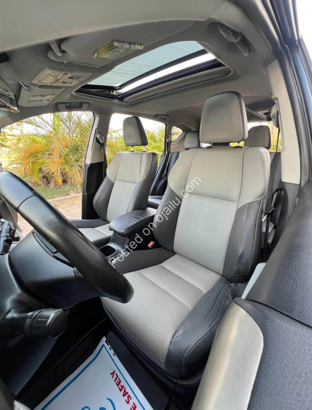 Luxury RAV4: Low Miles, Sunroof, Leather