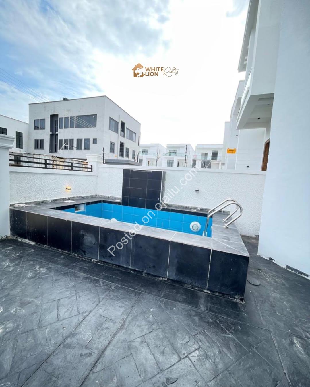 Sleek 4-Bed Duplex with Resort-Style Pool in Chevron