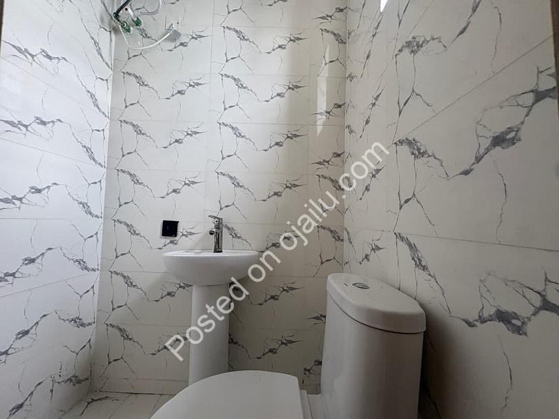 Modern 2-Bed Terrace: En-Suite Bliss in Ogombo