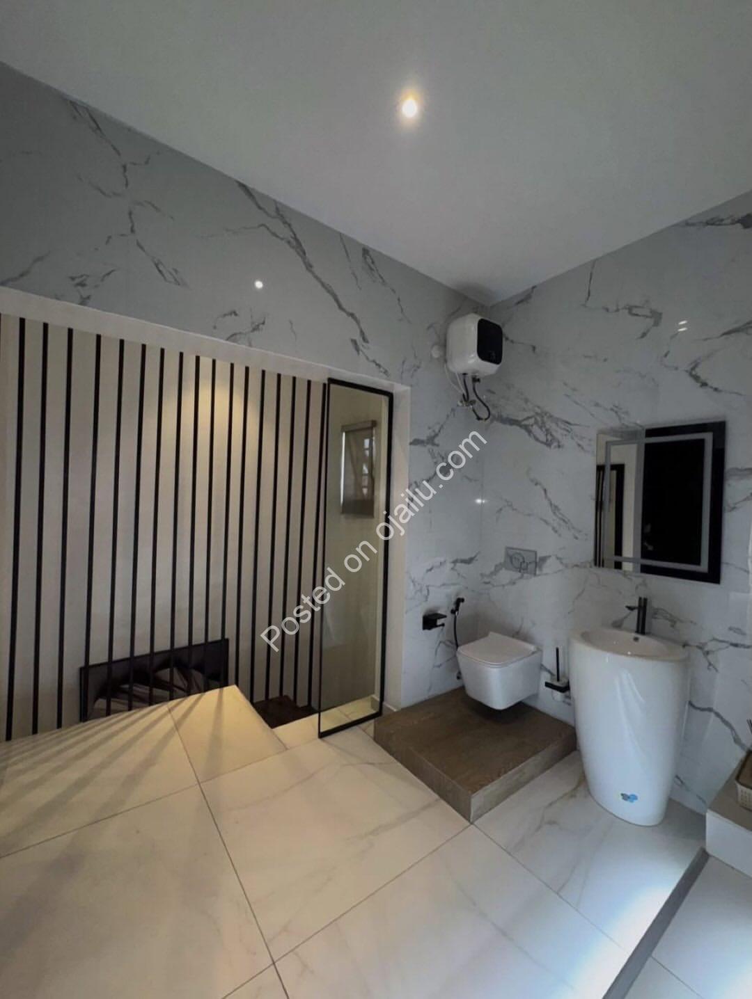 Smart Triplex Masterpiece in Prestigious New GRA