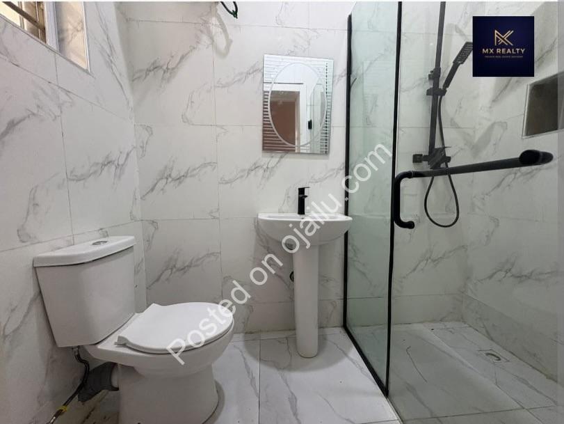 Your Dream Lagos Oasis: 5-Bedroom Haven with Cinema & Pool