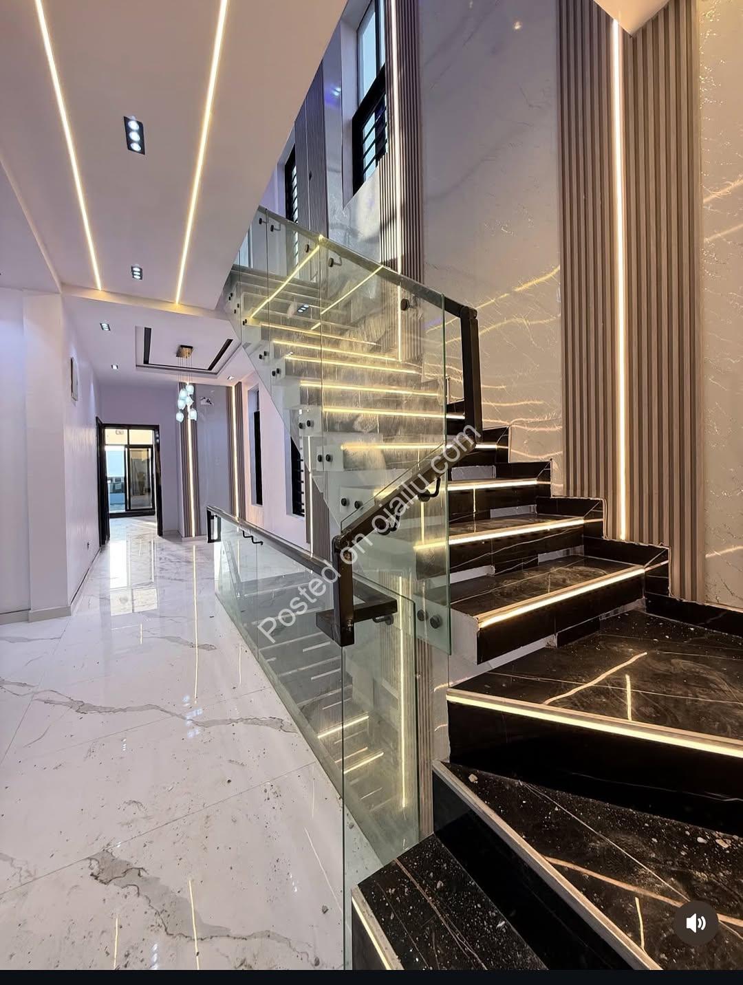 Sleek 5-Bedroom Duplex with Rooftop Cinema & Pool