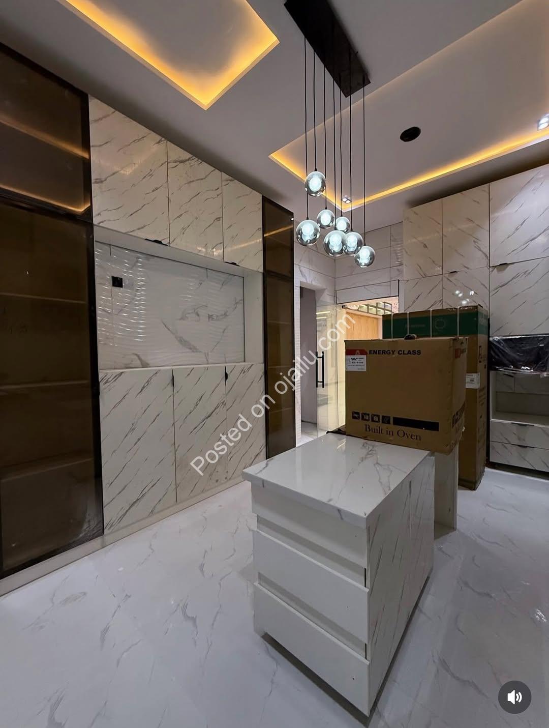 Sleek 5-Bedroom Duplex with Rooftop Cinema & Pool