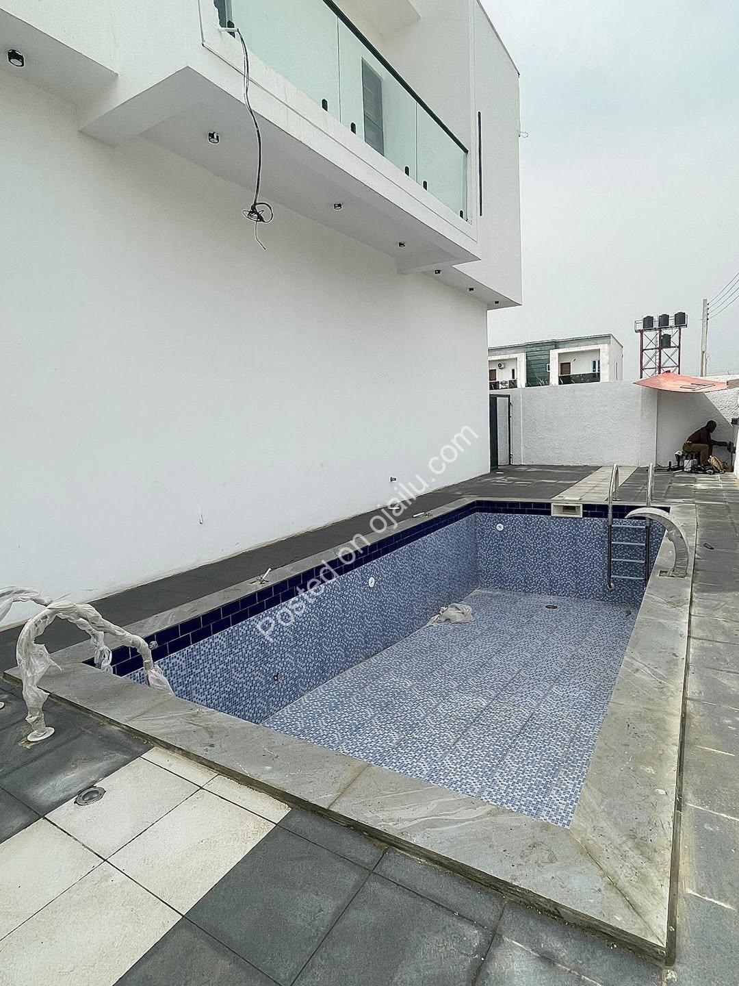 Exquisite 4-Bedroom Haven in Serene Ikota Estate