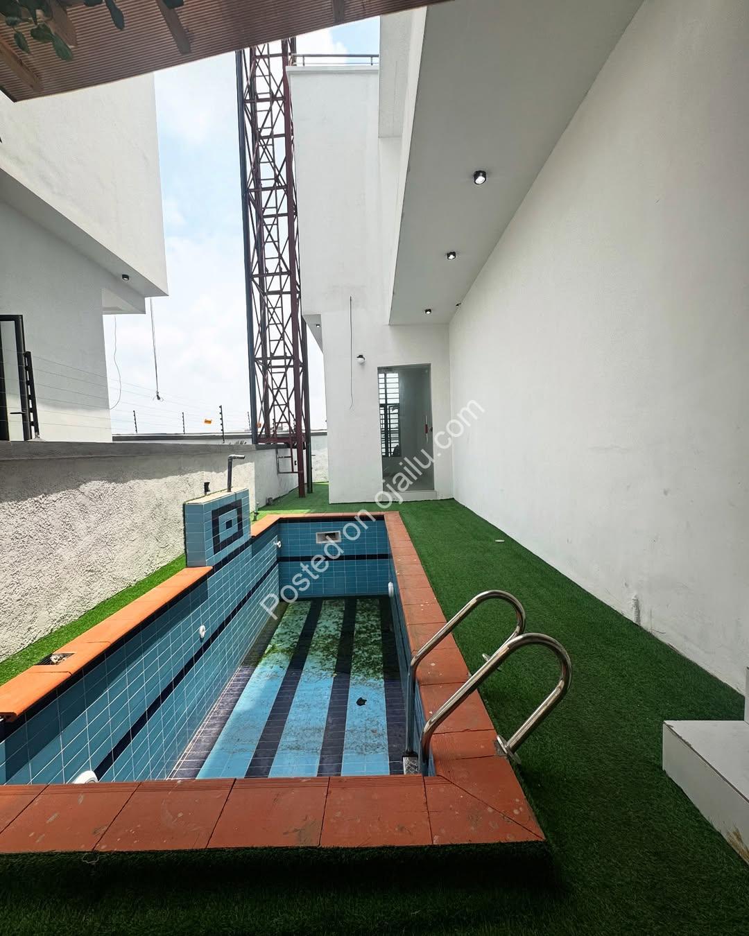 Exclusive Chevron Estate: 6-Bed Duplex with Cinema & Pool