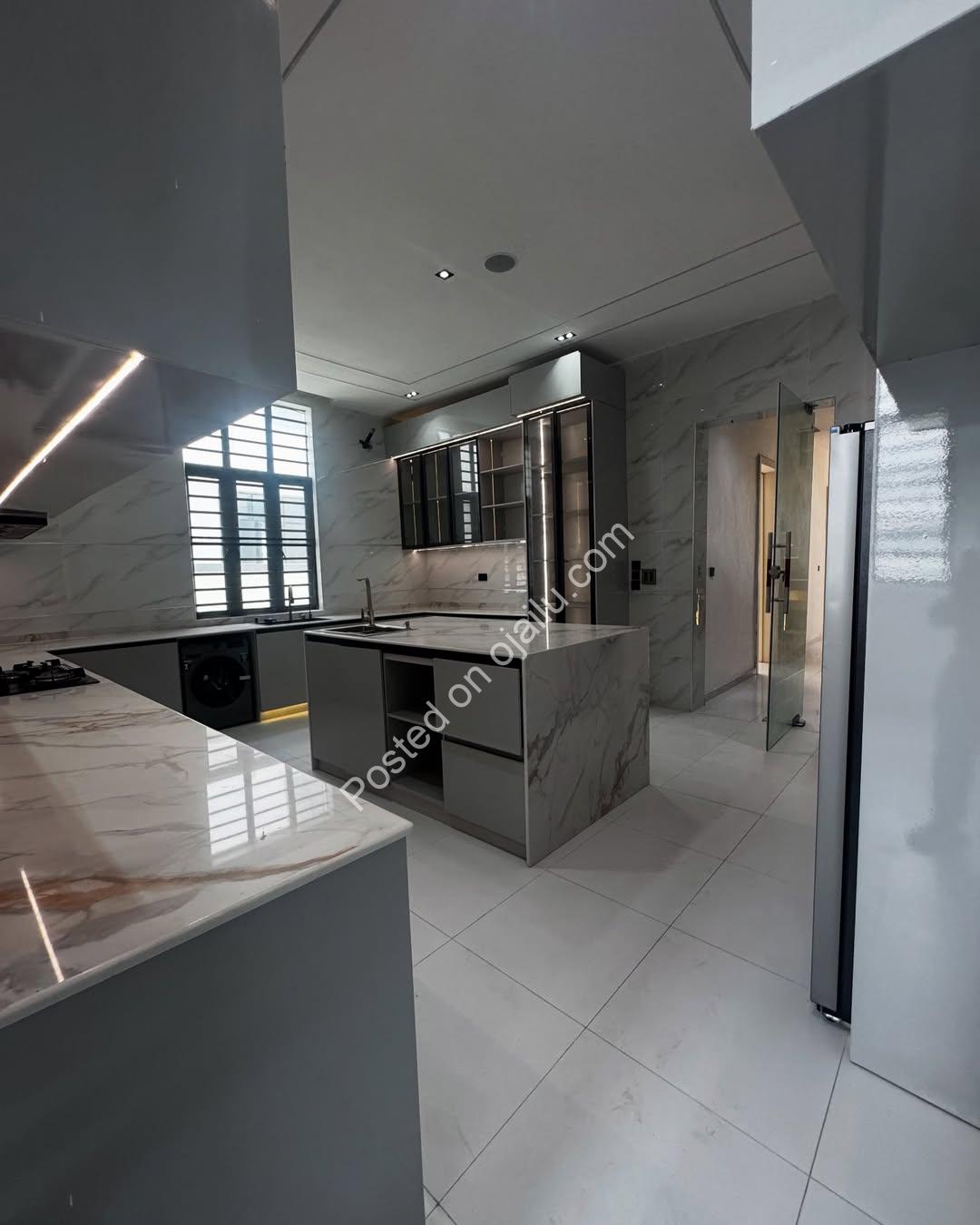 Exclusive Chevron Estate: 6-Bed Duplex with Cinema & Pool