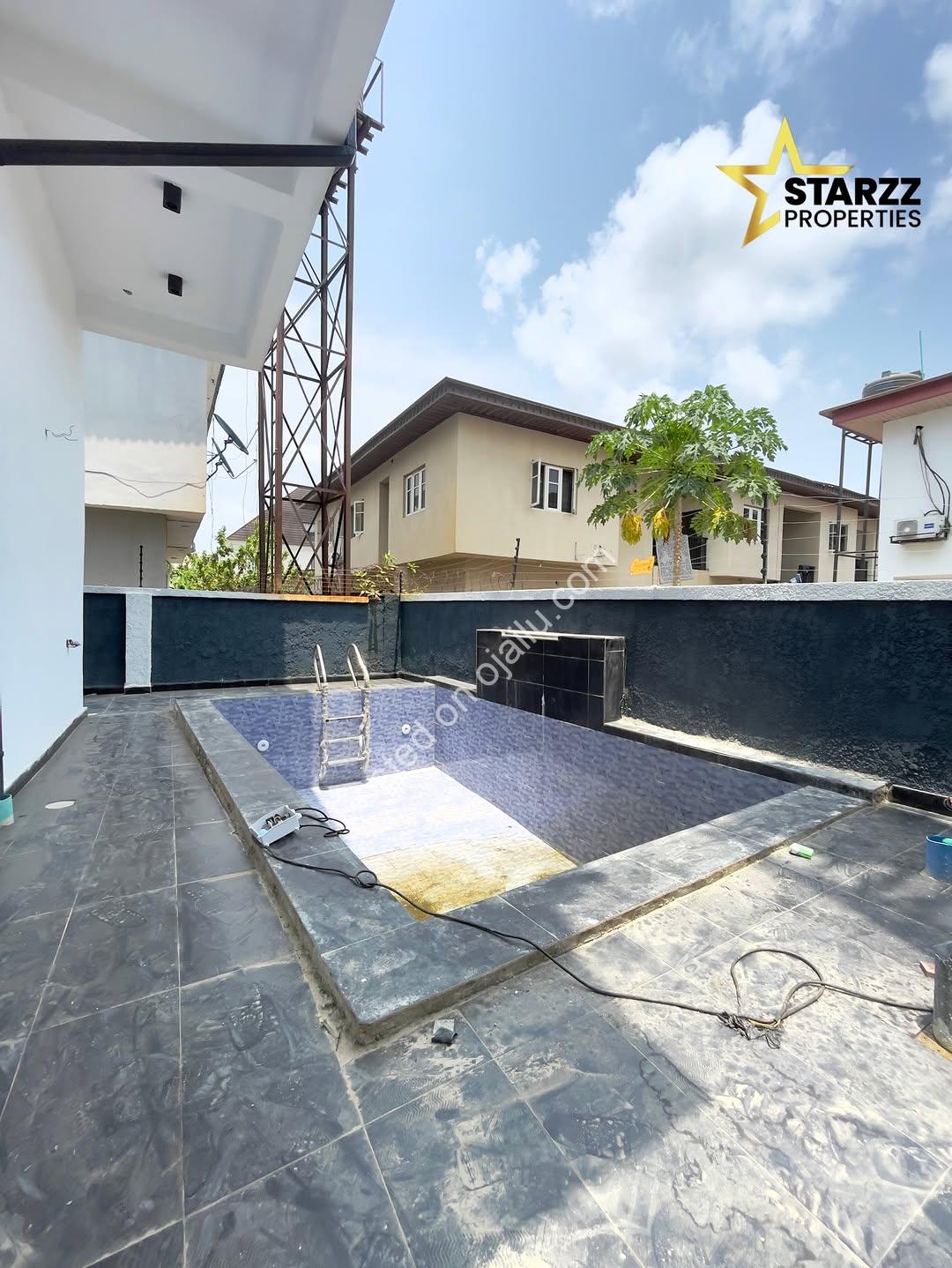 Sleek 5-Bedroom Oasis with Pool in Sangotedo