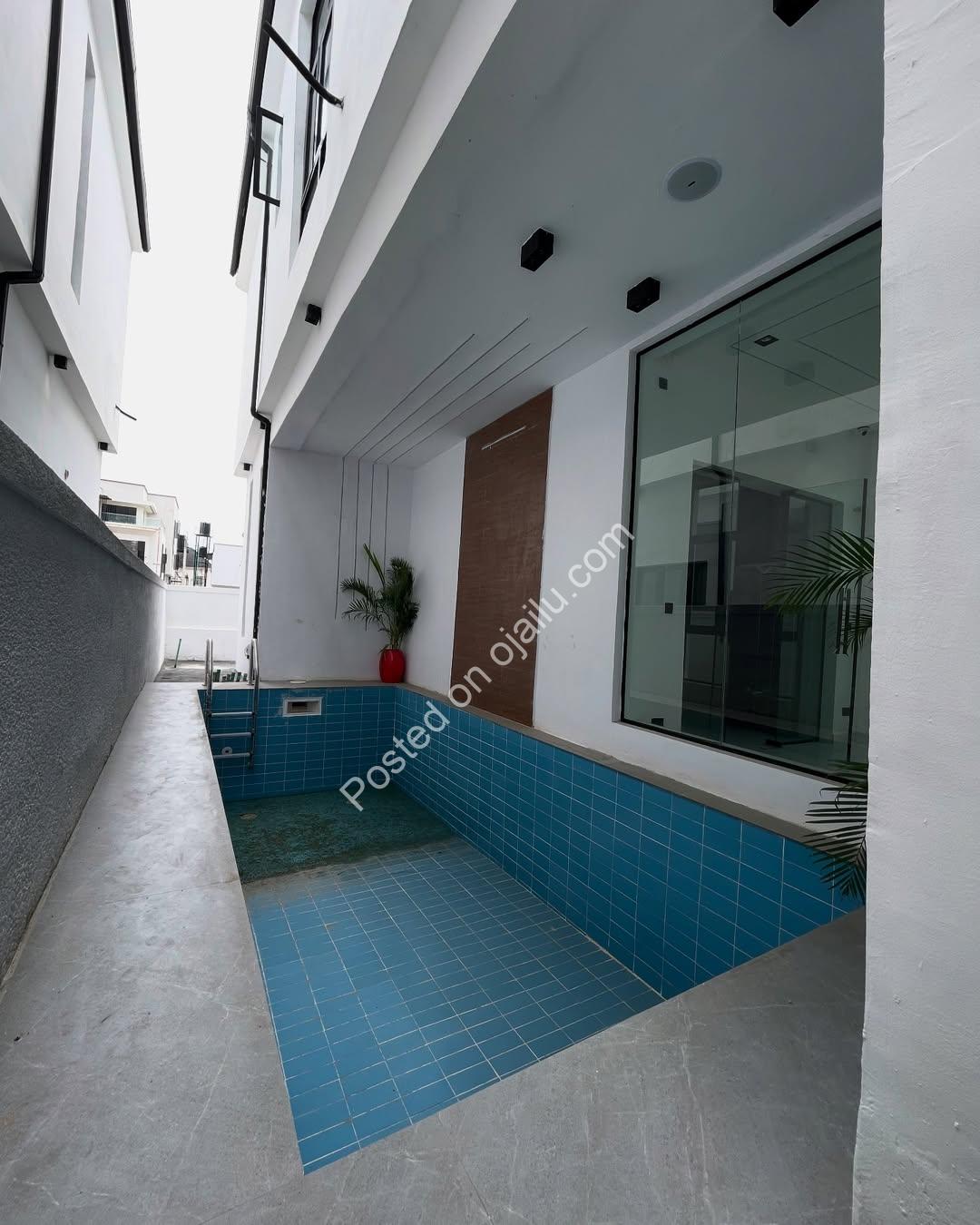 Exclusive Ikota Estate: 5-Bedroom Haven with Pool & Jacuzzi