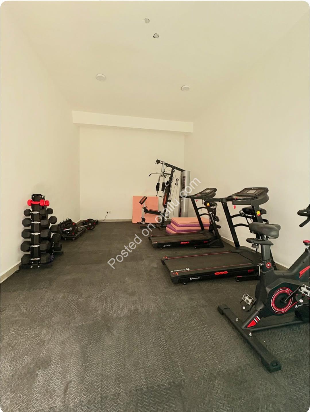 Elevator Luxury: 3BR Ikate Haven with Gym & Consent