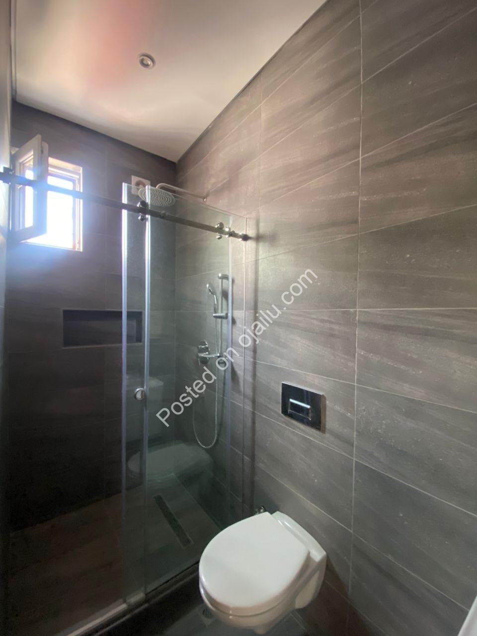 Lagos Opulence: 4BR Poolside Estate with Cinema