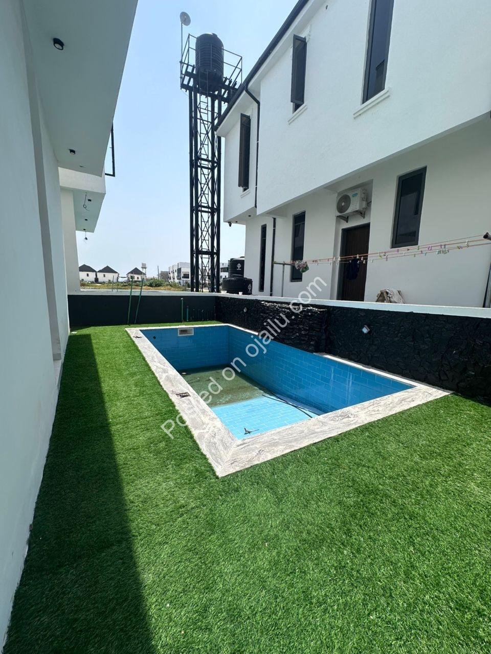 Sleek 5-Bed Villa with Pool & Cinema in Gated Estate