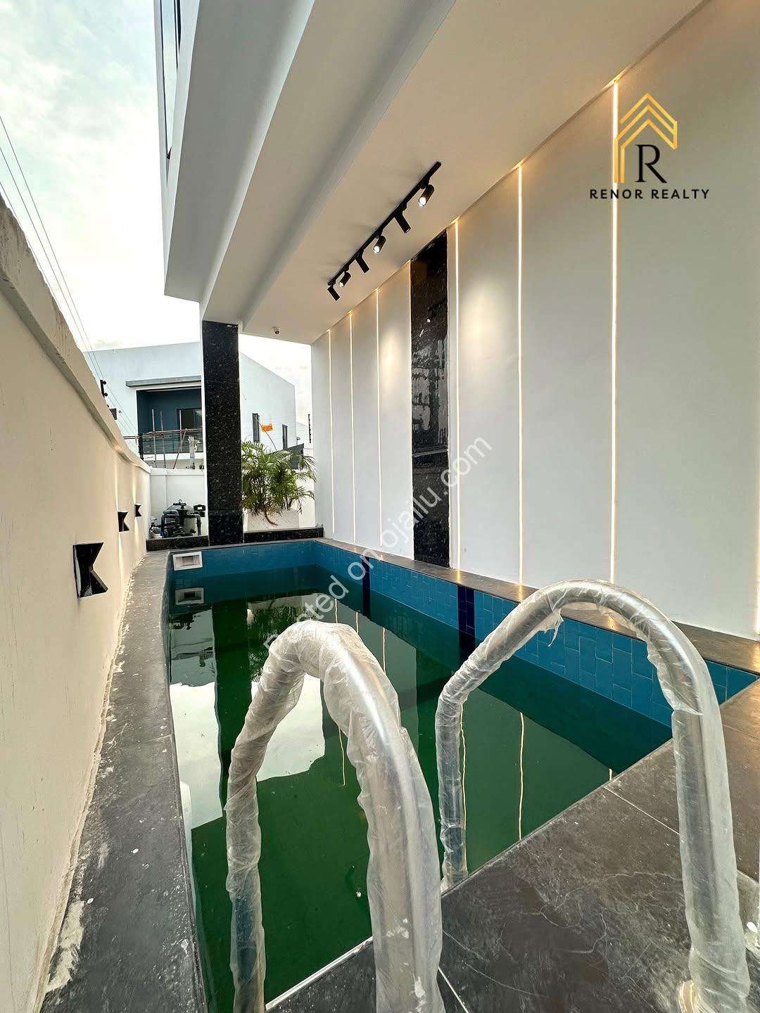 Sleek 5-Bedroom Haven with Resort-Style Pool in Ikota