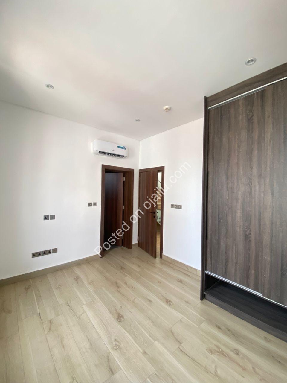 Lagos Opulence: 4BR Poolside Estate with Cinema