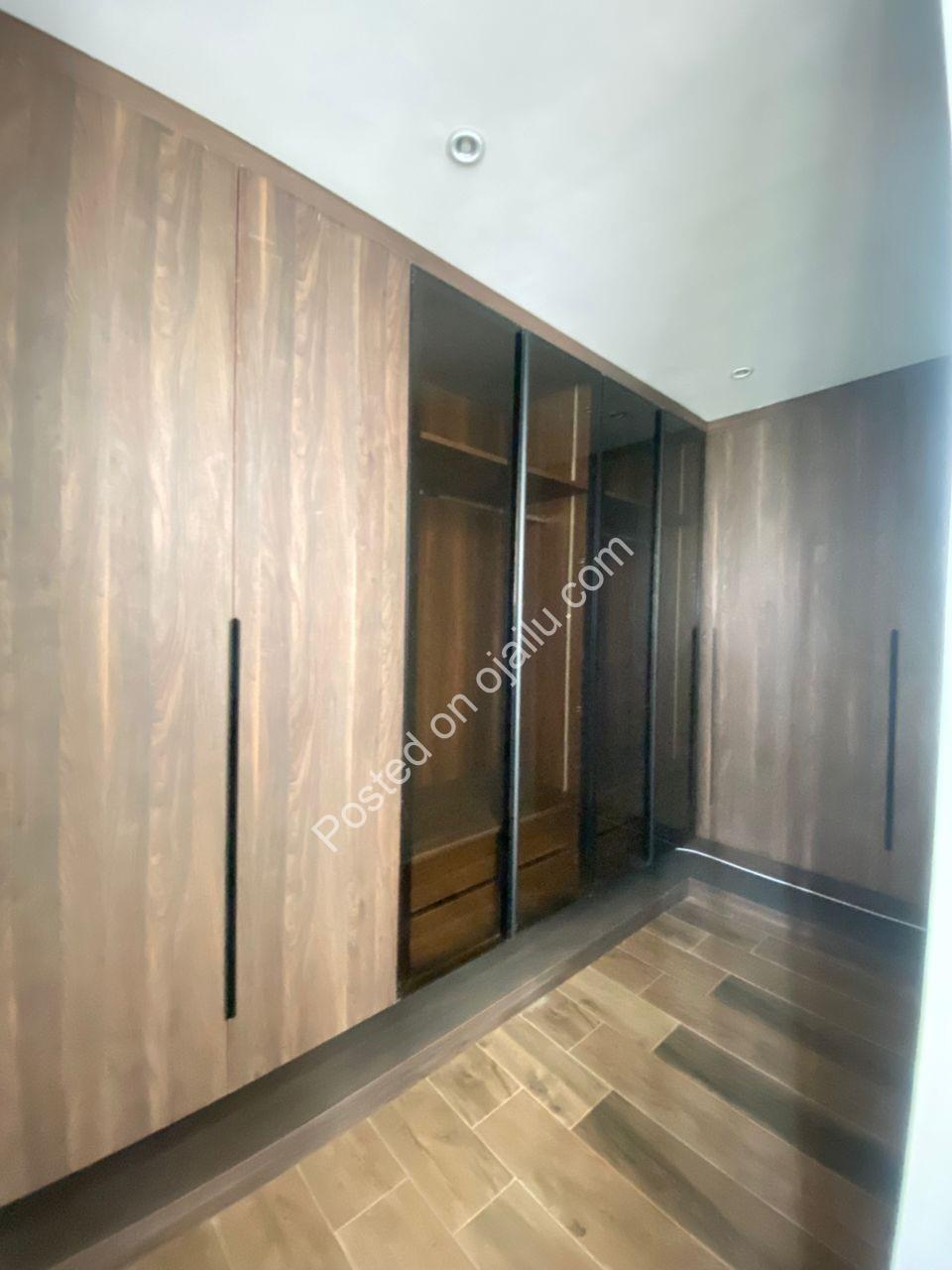 Lagos Opulence: 4BR Poolside Estate with Cinema