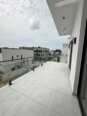 Chevron’s Finest: 4-Bed Haven with Rooftop Terrace