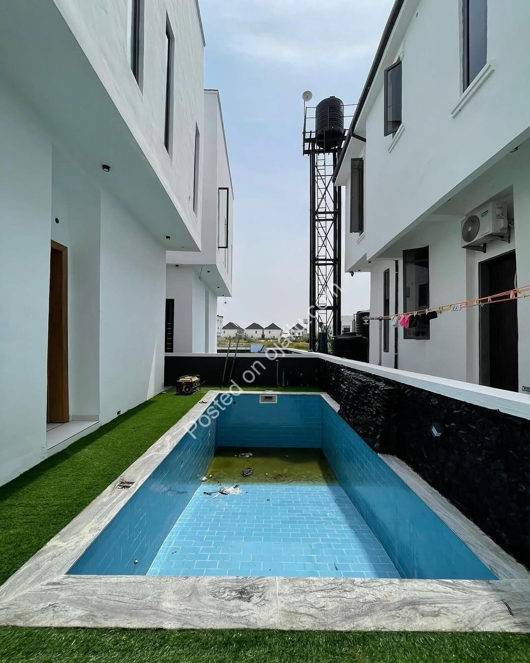Elegant 5-Bedroom Haven with Pool & BQ