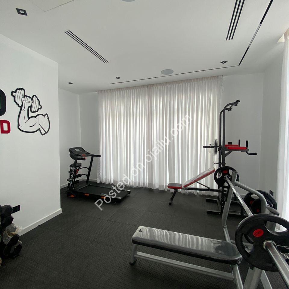 Elevator to Elegance: 5-Bed Ikate Haven with Pool & Gym