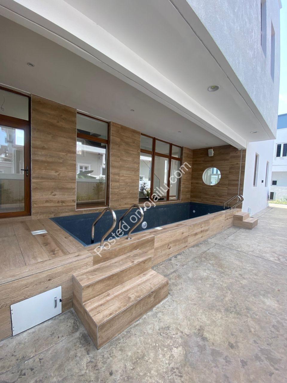 Lagos Opulence: 4BR Poolside Estate with Cinema