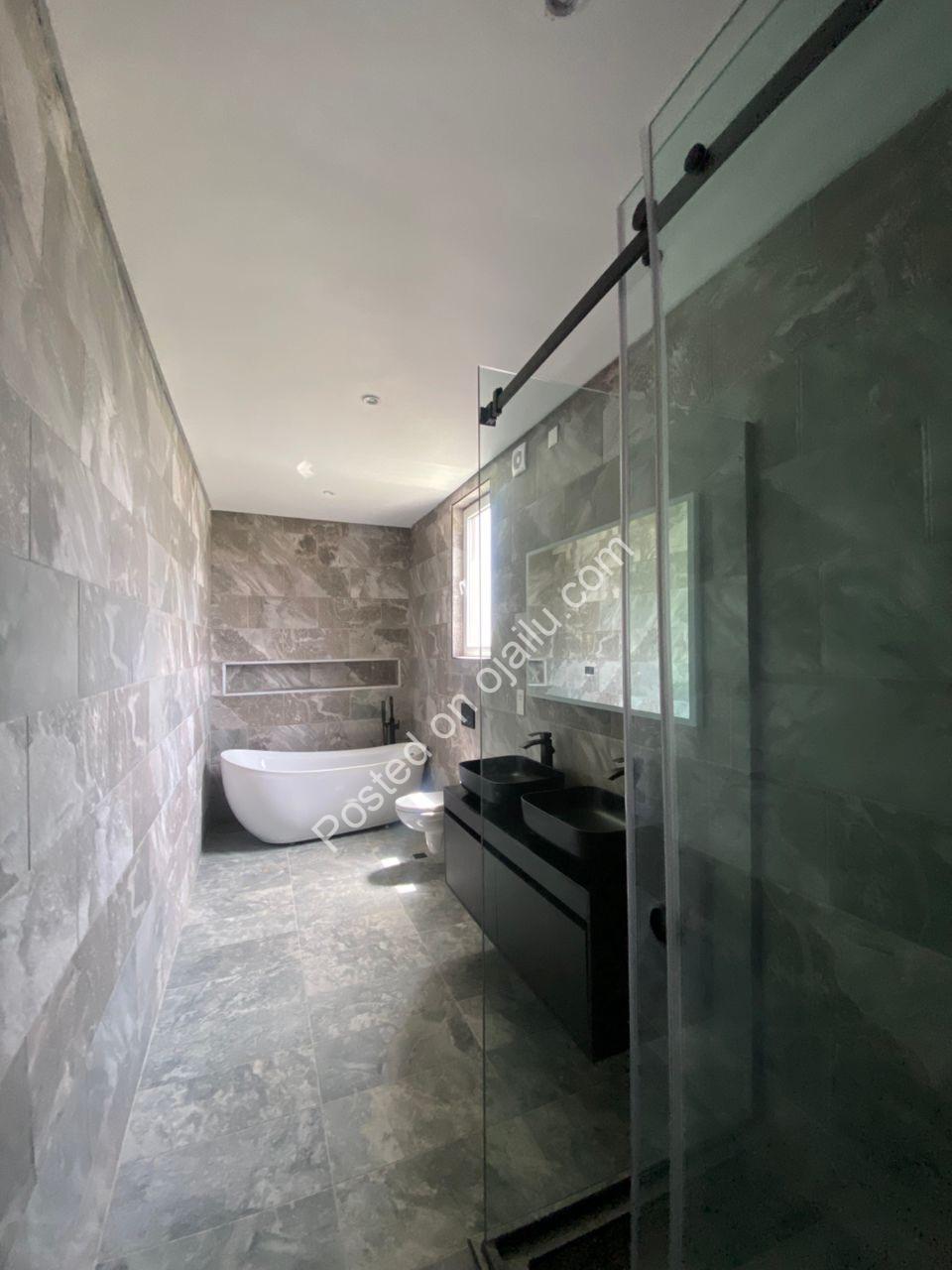 Lagos Opulence: 4BR Poolside Estate with Cinema