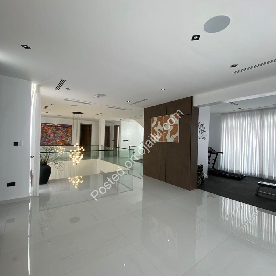 Elevator to Elegance: 5-Bed Ikate Haven with Pool & Gym