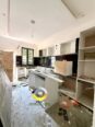 Contemporary 4-Bed Duplex with Bluetooth Speakers & Pendant Lights