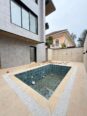 Ikoyi’s Ultimate Entertainer: 6-Bedroom Duplex with Cinema & Rooftop