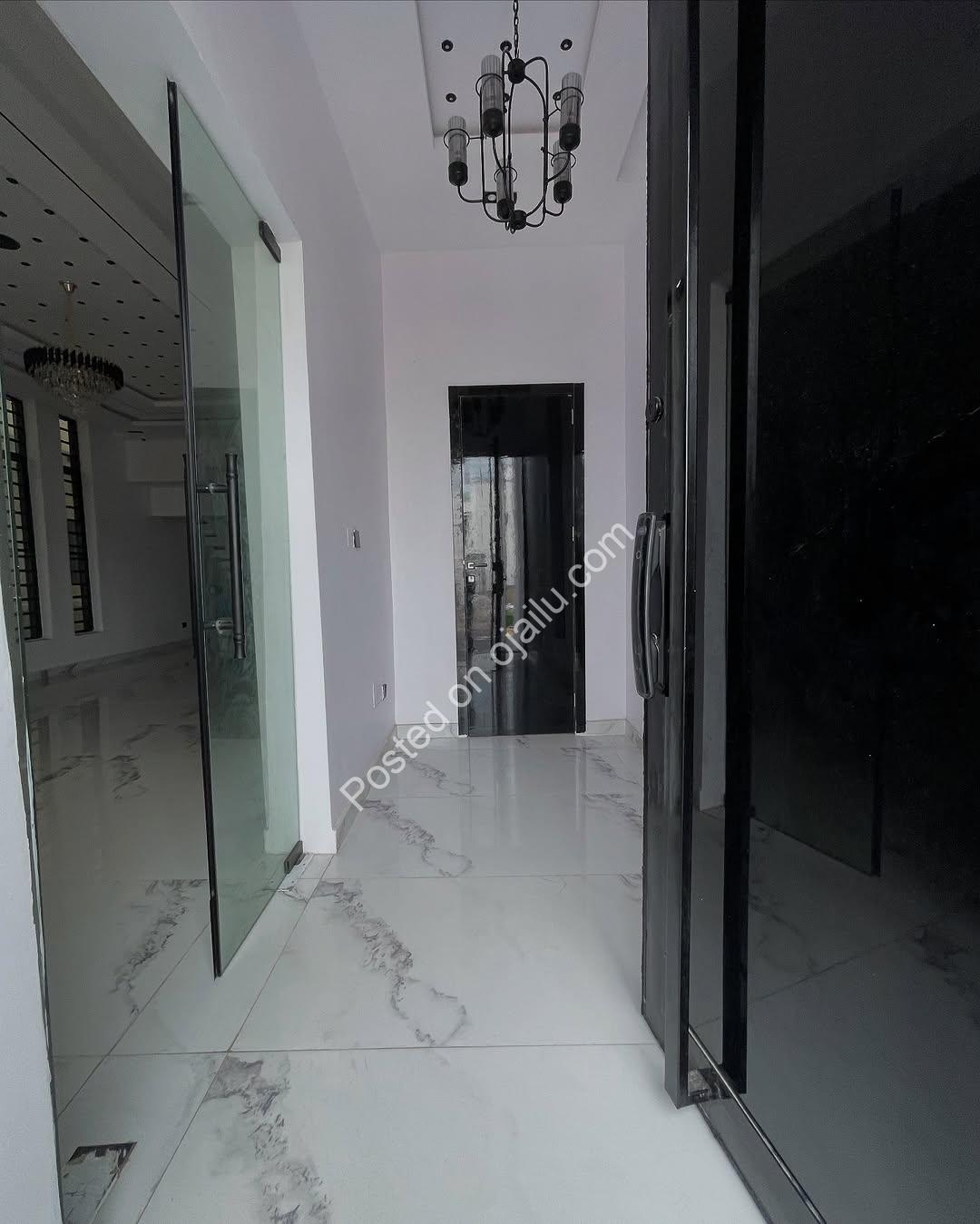 **Jacuzzi & Pool Oasis: 5BR Ikota Duplex – 400M**