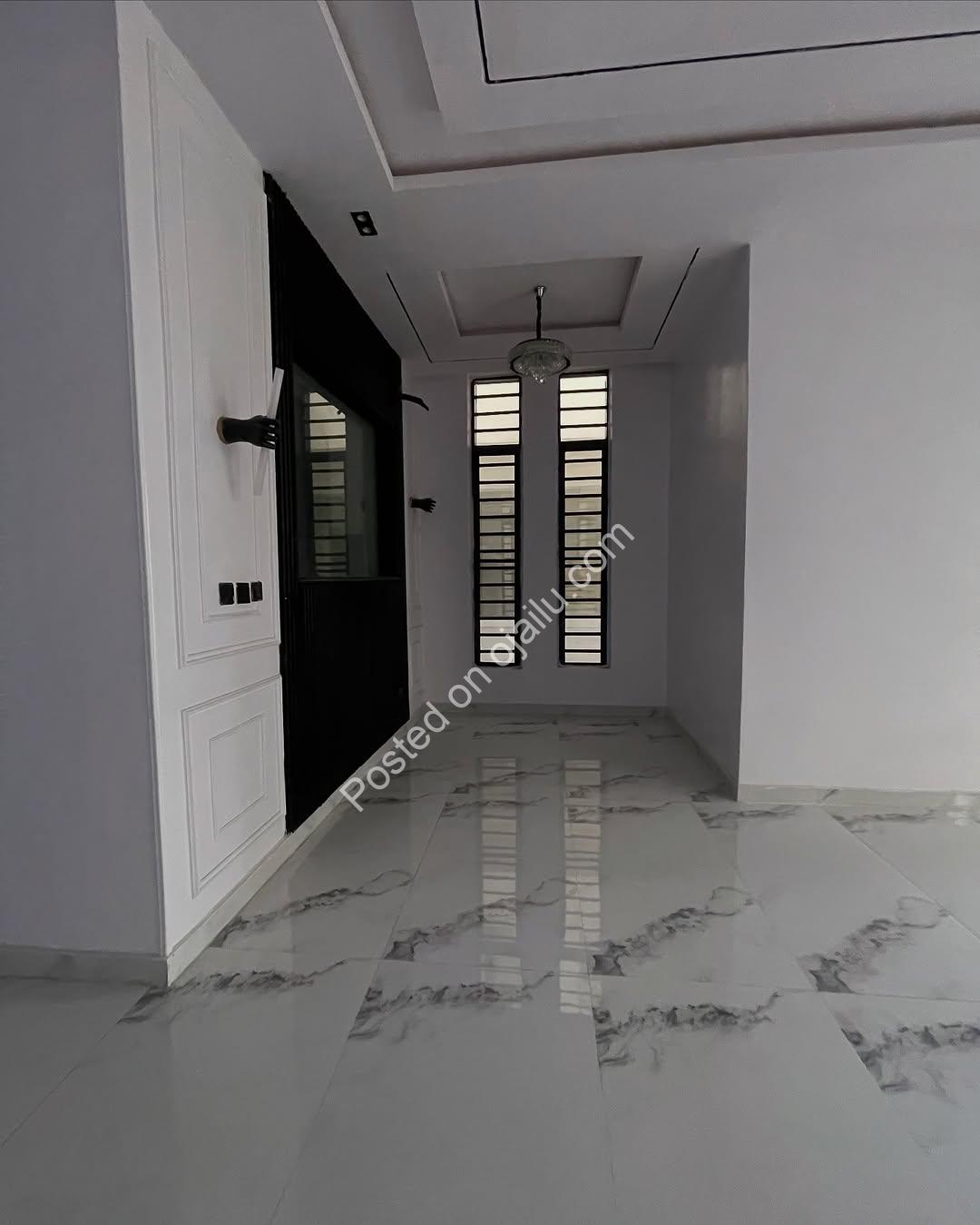 **Jacuzzi & Pool Oasis: 5BR Ikota Duplex – 400M**