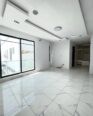 Soundproof Smart Home with Modern Finishes in Agungi