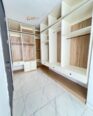 Soundproof Smart Home with Modern Finishes in Agungi