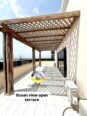 Experience Ocean-View Luxury: 6-Bed Duplex with Cinema & Rooftop Terrace