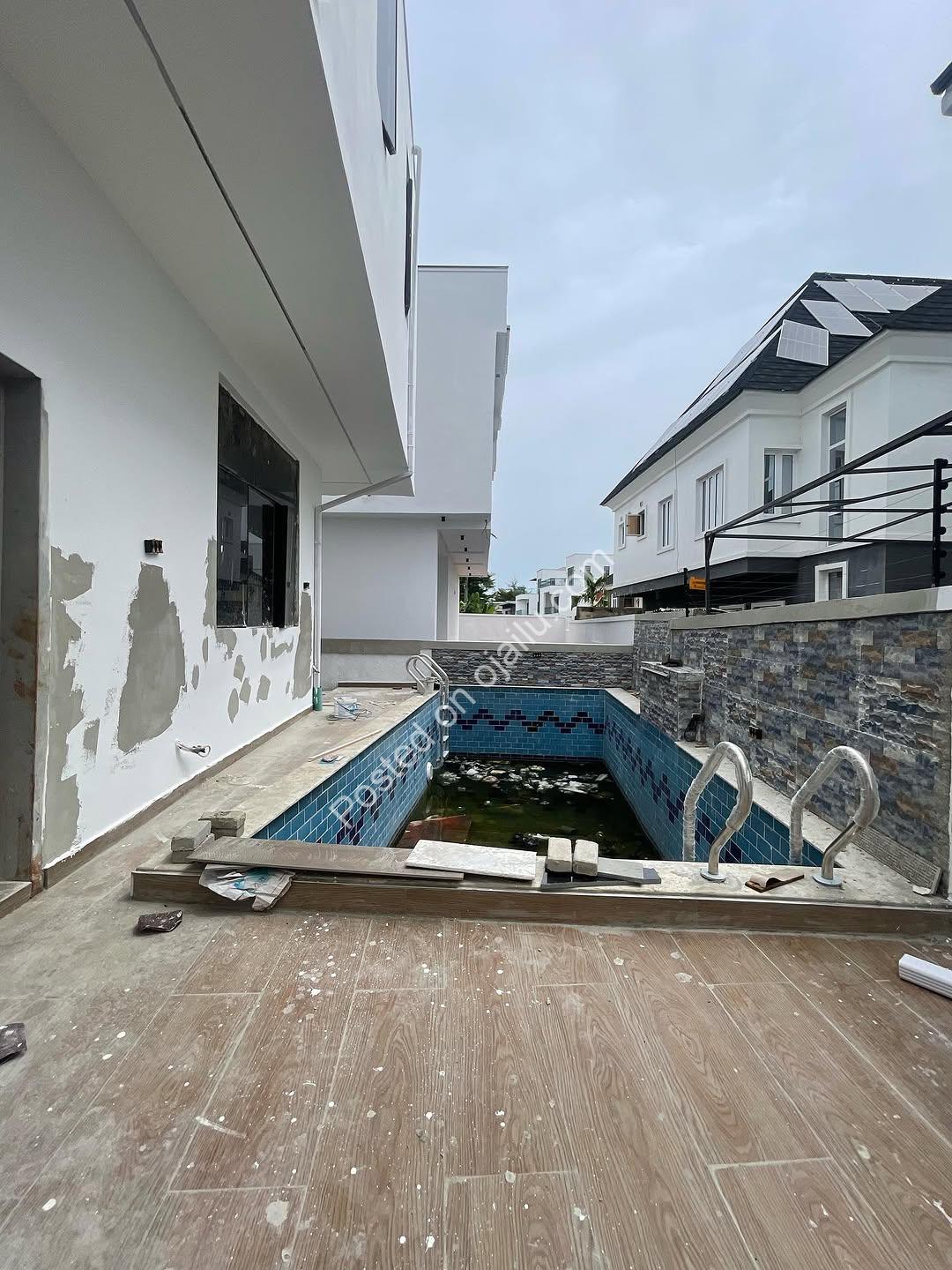 Your Private Resort Awaits: 5BR Duplex with Cinema & Pool