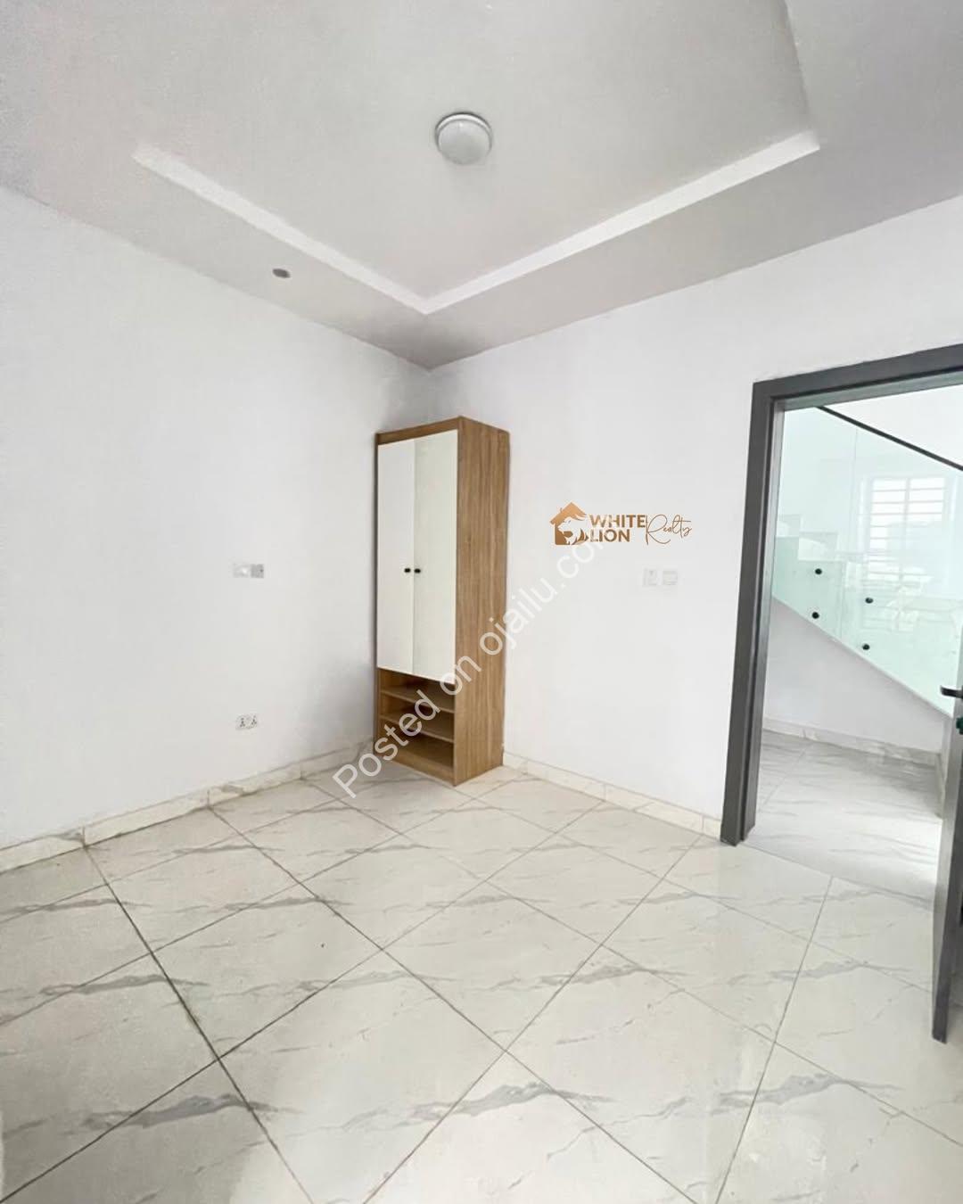 Soundproof Smart Home with Modern Finishes in Agungi